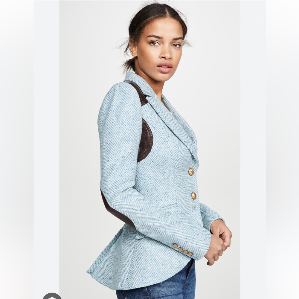 Smythe equestrian rifle patch tweed blazer.